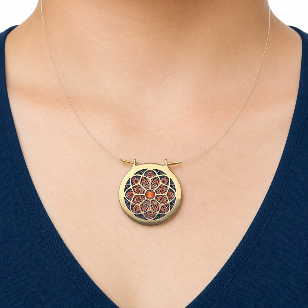 https://www.noajewellery.com/range/rose-window-pendant-brass-frame/