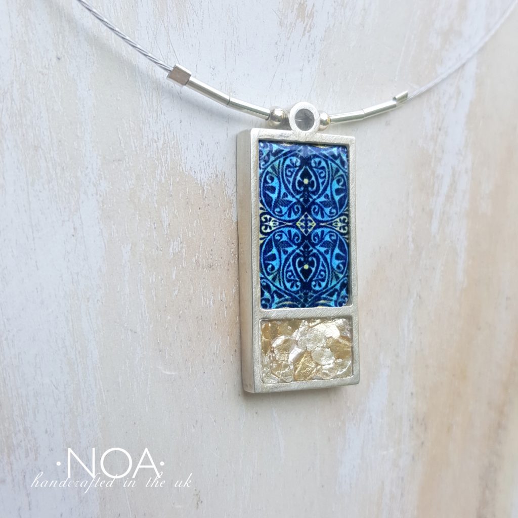 https://www.noajewellery.com/range/framed-rectangle-ceramic-necklace-large/