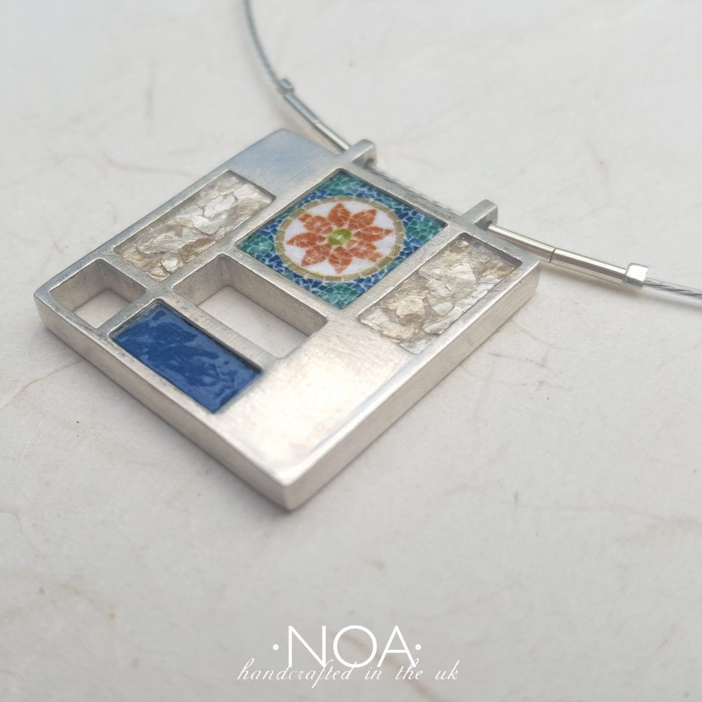 https://www.noajewellery.com/range/destijl-pendant-silver-ceramics/
