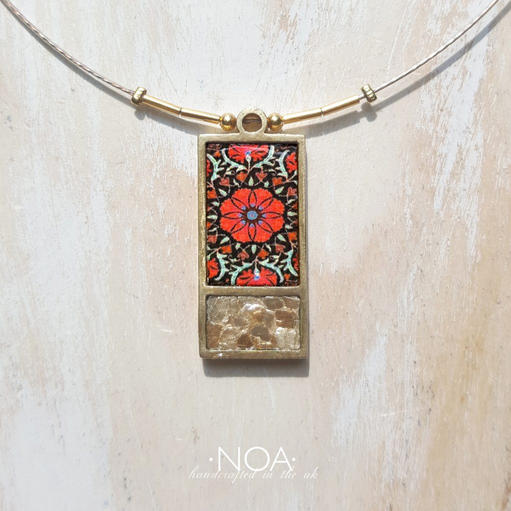https://www.noajewellery.com/range/framed-rectangular-ceramic-necklace-brass/