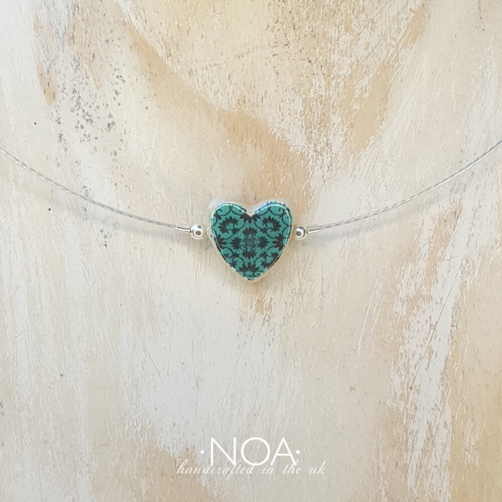 S104 (7) Turquoise & Black