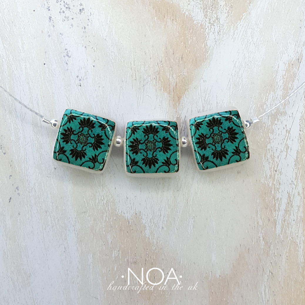 S124 (9) Turquoise & Black