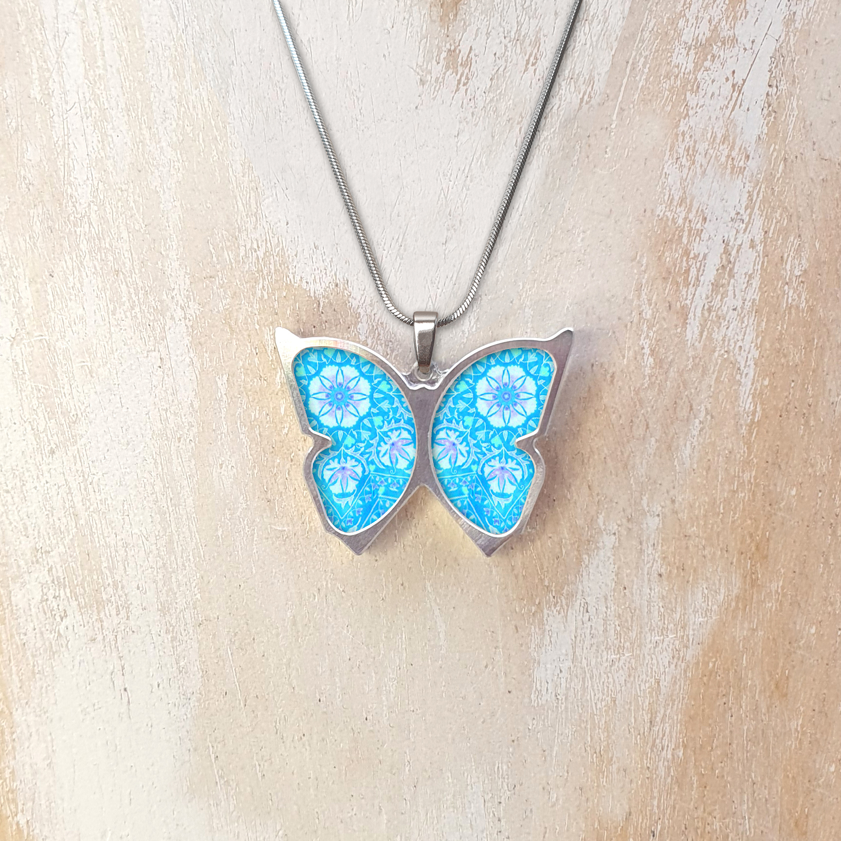 A133 (08) Light Blue & Purple Flower