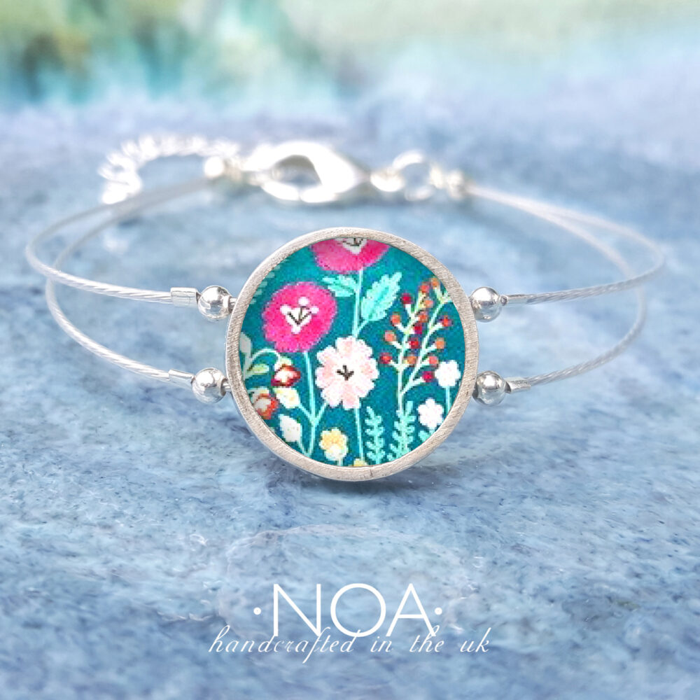 A151 (32) Flowers on Turquoise