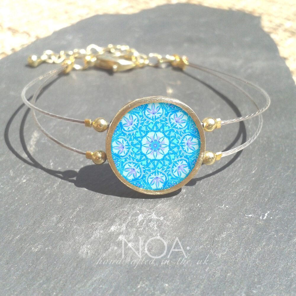 B151 (37) Light Blue & Purple Flower