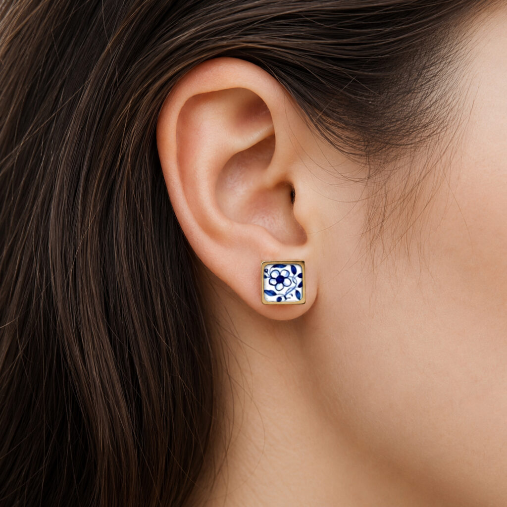 https://www.noajewellery.com/range/framed-square-ceramic-stud-earrings-gold/