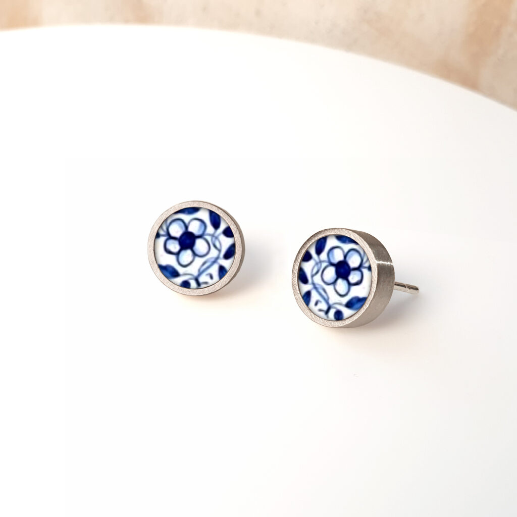 https://www.noajewellery.com/range/framed-round-ceramic-stud-earrings/
